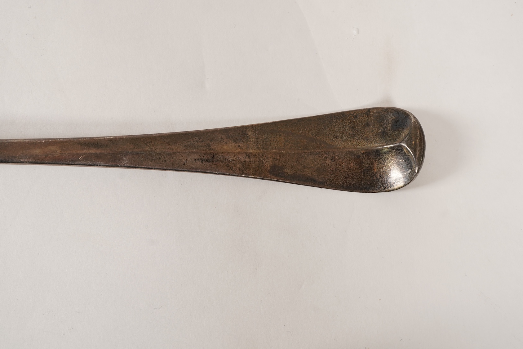 A George II silver Hanoverian pattern large basting or hash spoon